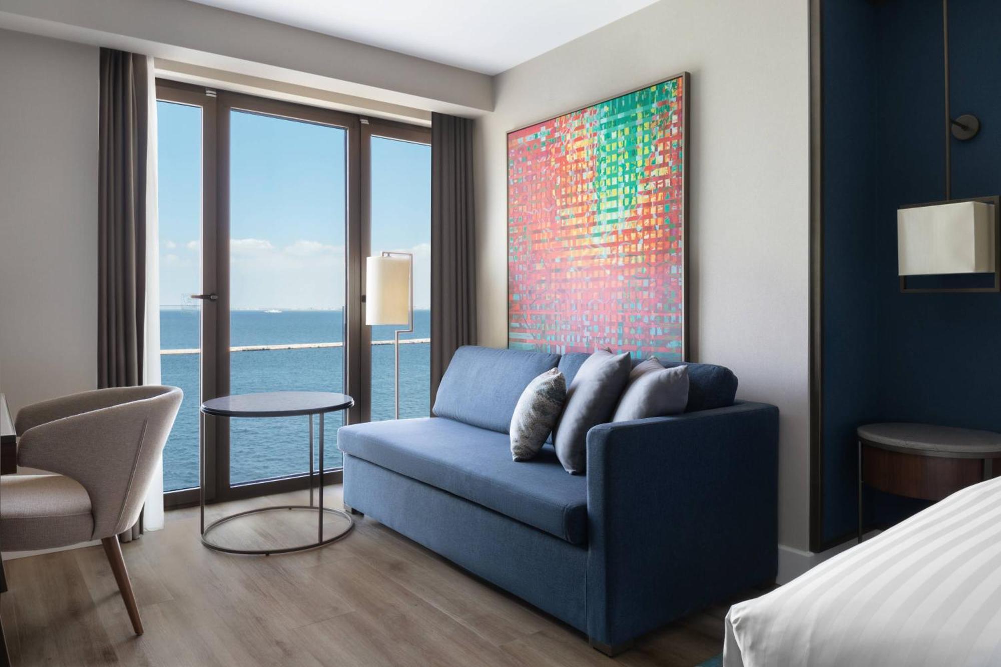 Executive Zimmer mit Kingsize-Bett, Meerblick und Zugang zur Executive Lounge