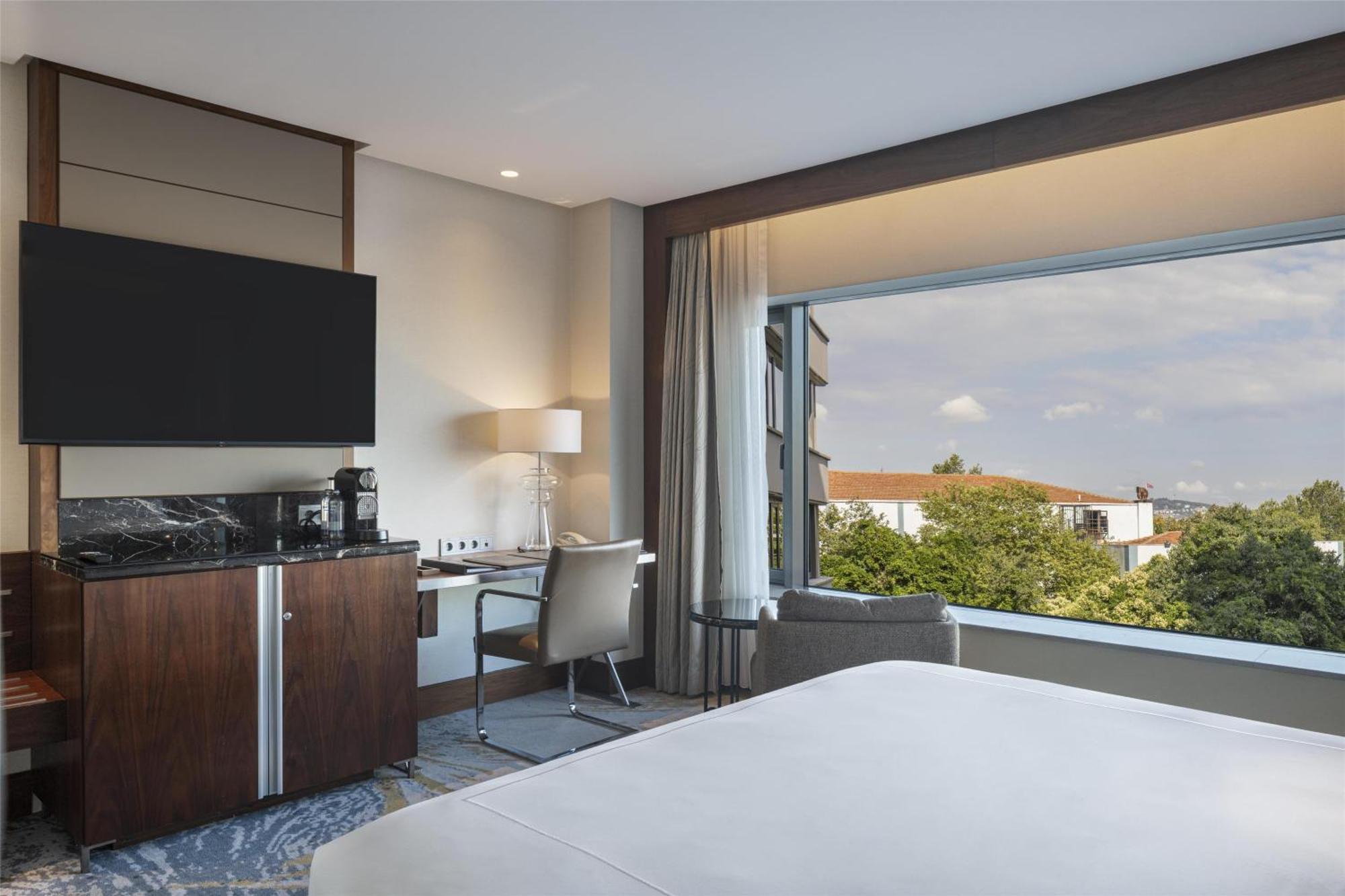 Deluxe Zimmer mit Kingsize-Bett