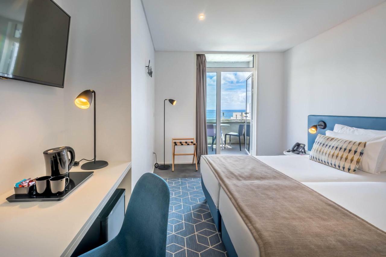 Doppel-/Zweibettzimmer mit Meerblick